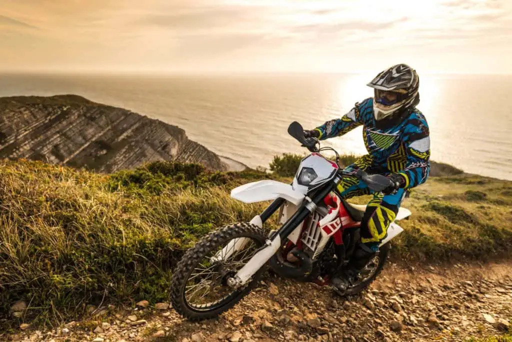 Enduro rider climbing a steep slop