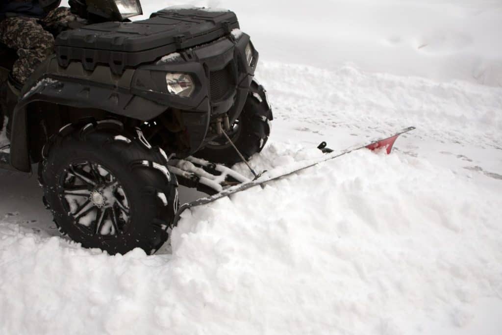 ATV converted into a plow truck