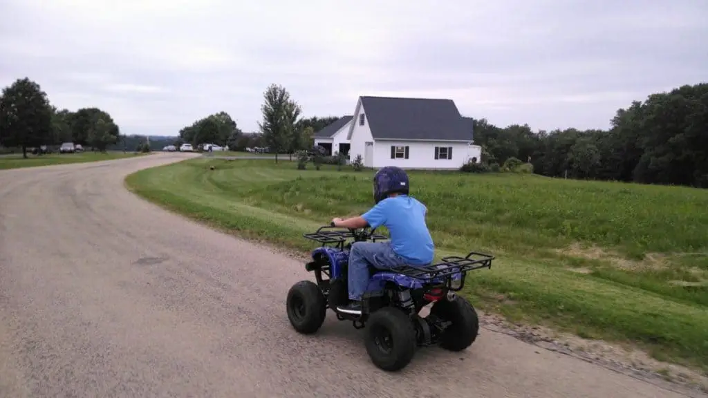 Boy riding an ATV