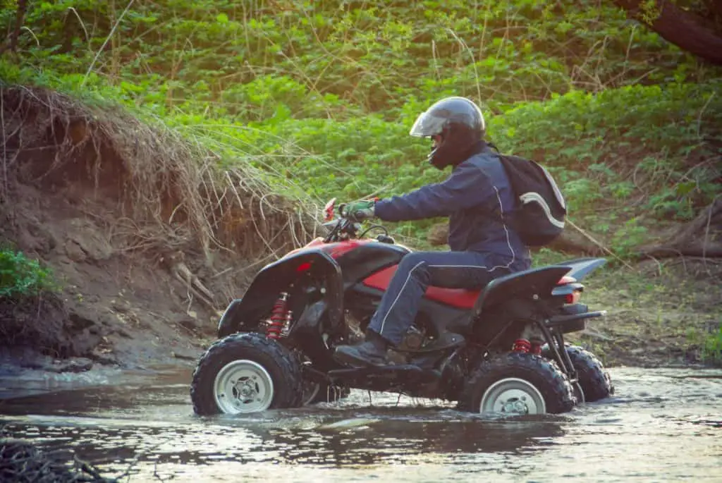 ATV Rider in the action on Honda TRX700XX side